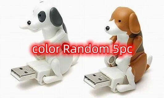 USB dancing dog toy in random colour made from ABS plastic on a desk