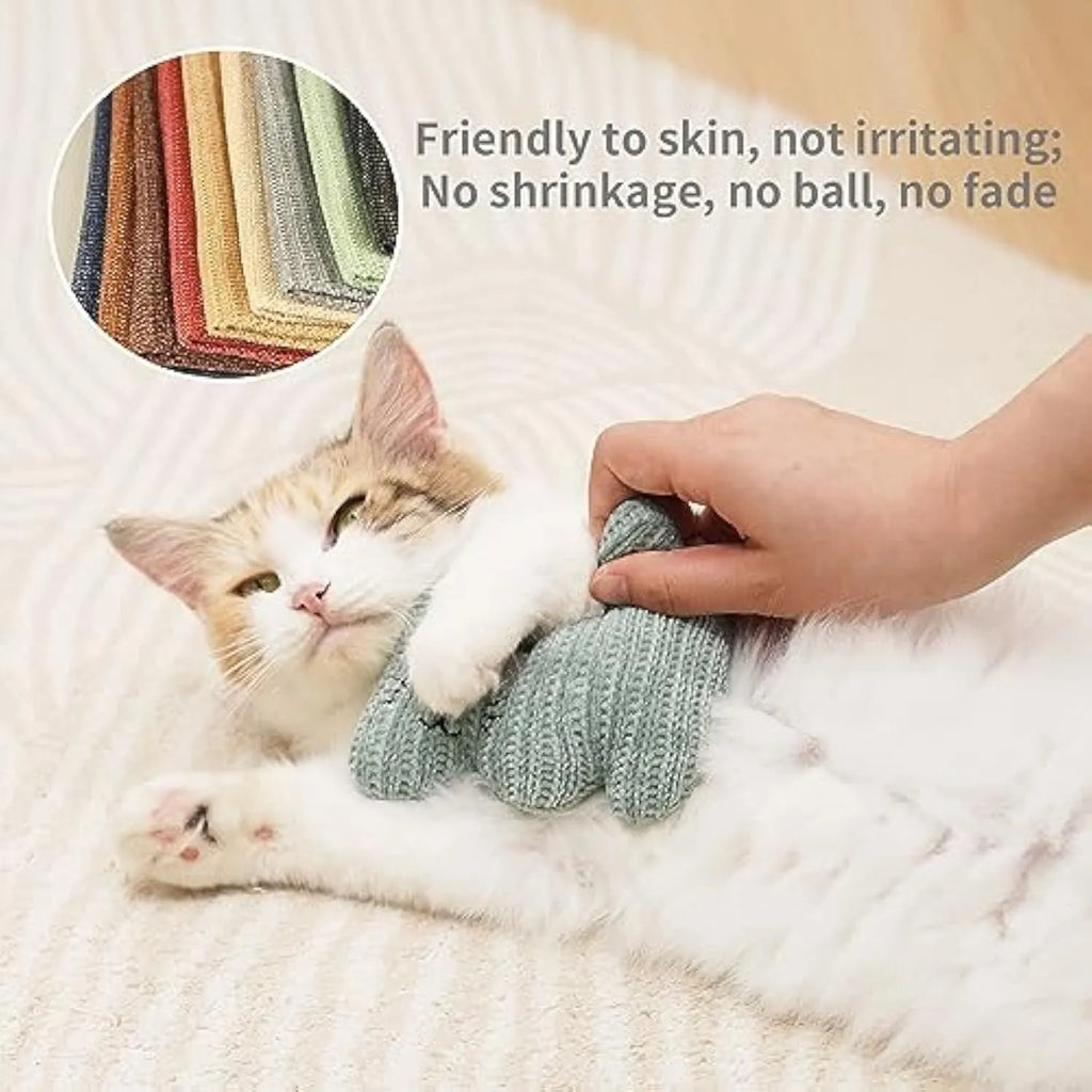 Cyan knitted plush cat toy with bell and catnip, measuring 12 by 11 centimetres.