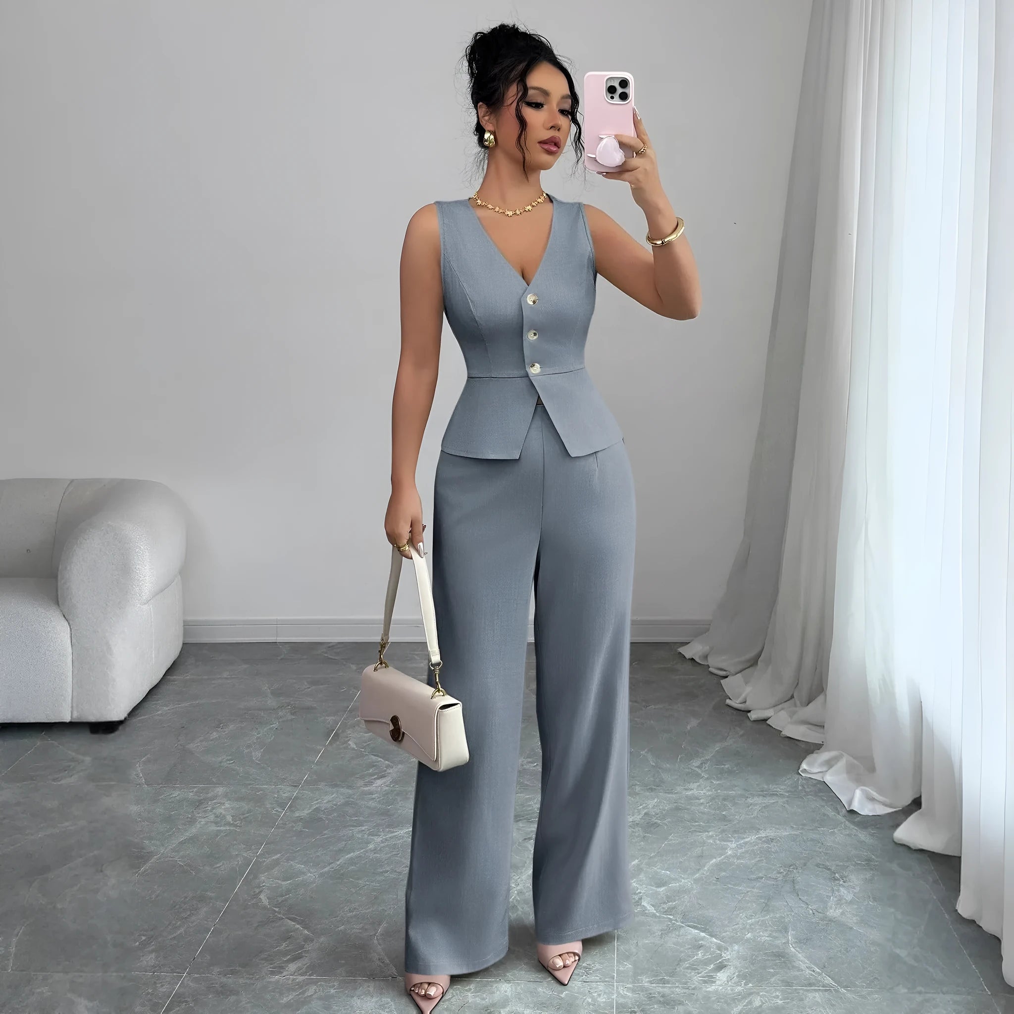 Women's solid colour two-piece set with sleeveless vest and high-waist trousers in casual styling