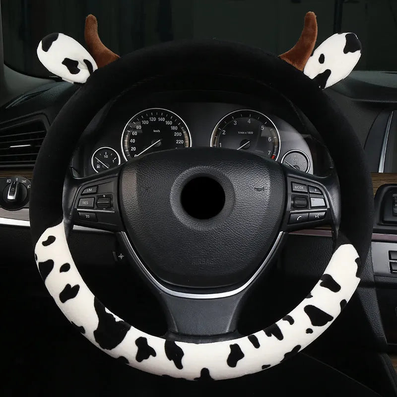 Black short plush steering wheel cover showing protective handle design on 38cm diameter