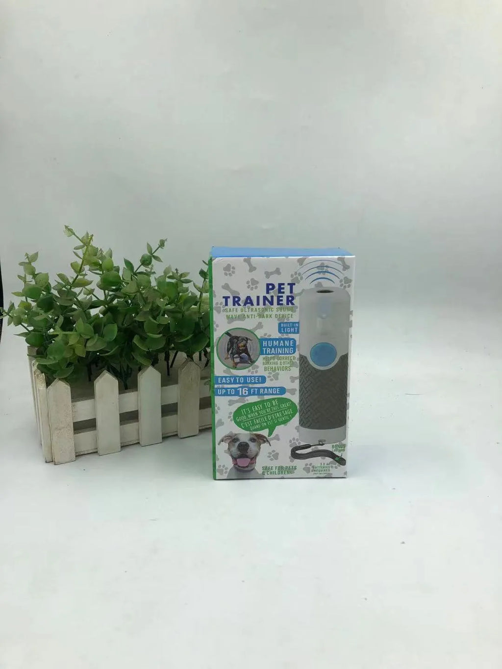 White ultrasonic dog bark stop trainer handheld device for behaviour control