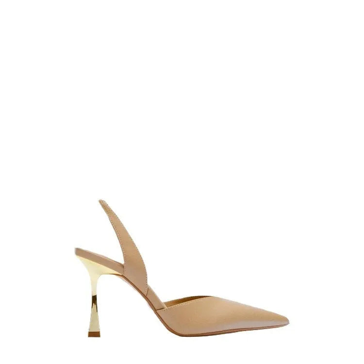 Women's patent leather pointed high heels in apricot and black colours, showing shallow mouth design.
