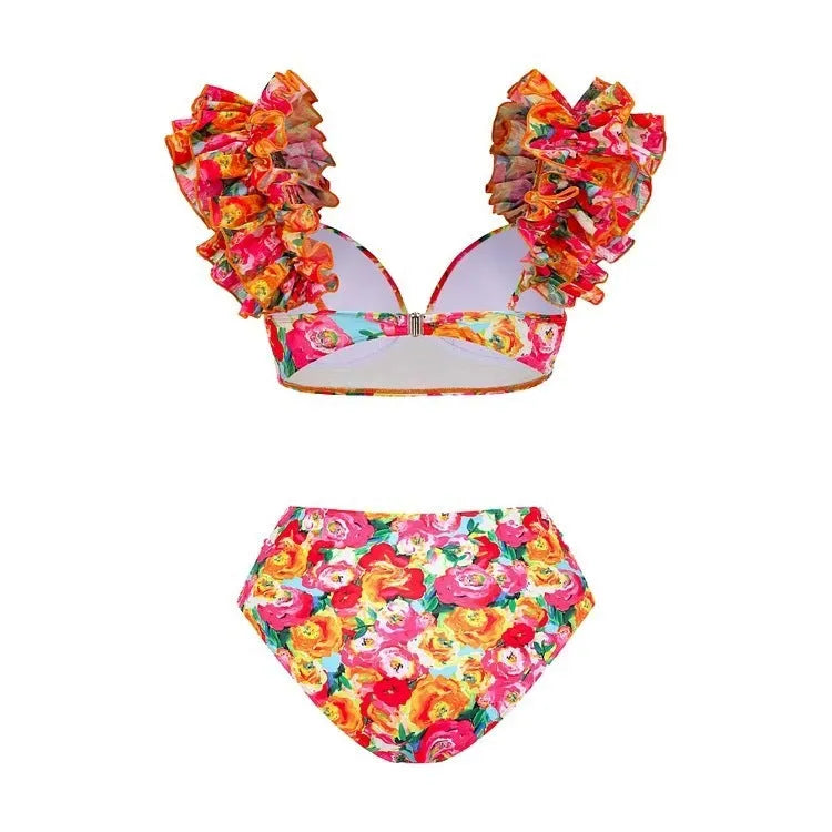 Women's floral print swimsuit with high waist bottom and push up bikini top in blue floral pattern