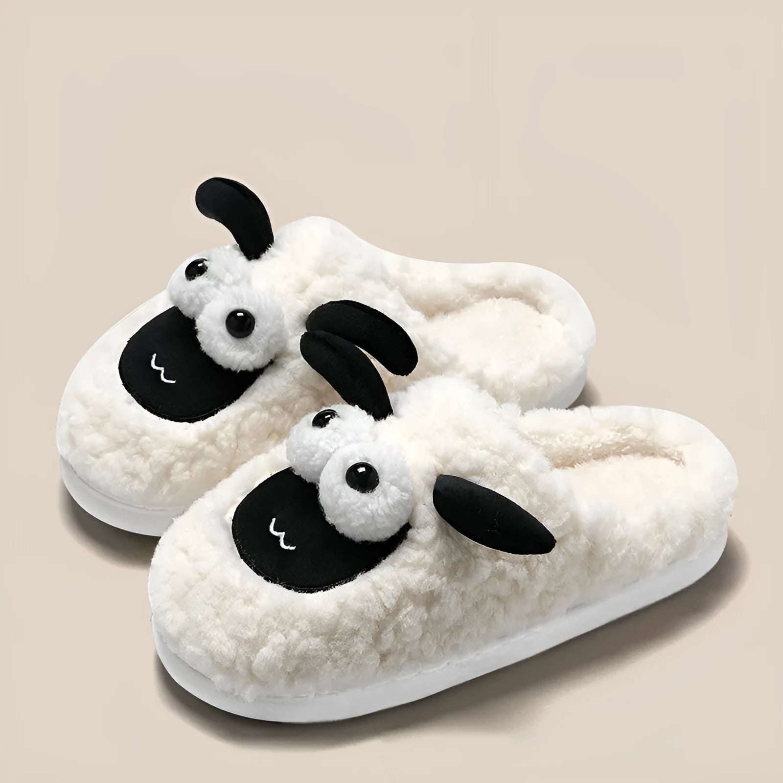 Simple lamb design thermal cotton suede slip-on slippers with a sewn PVC sole.
