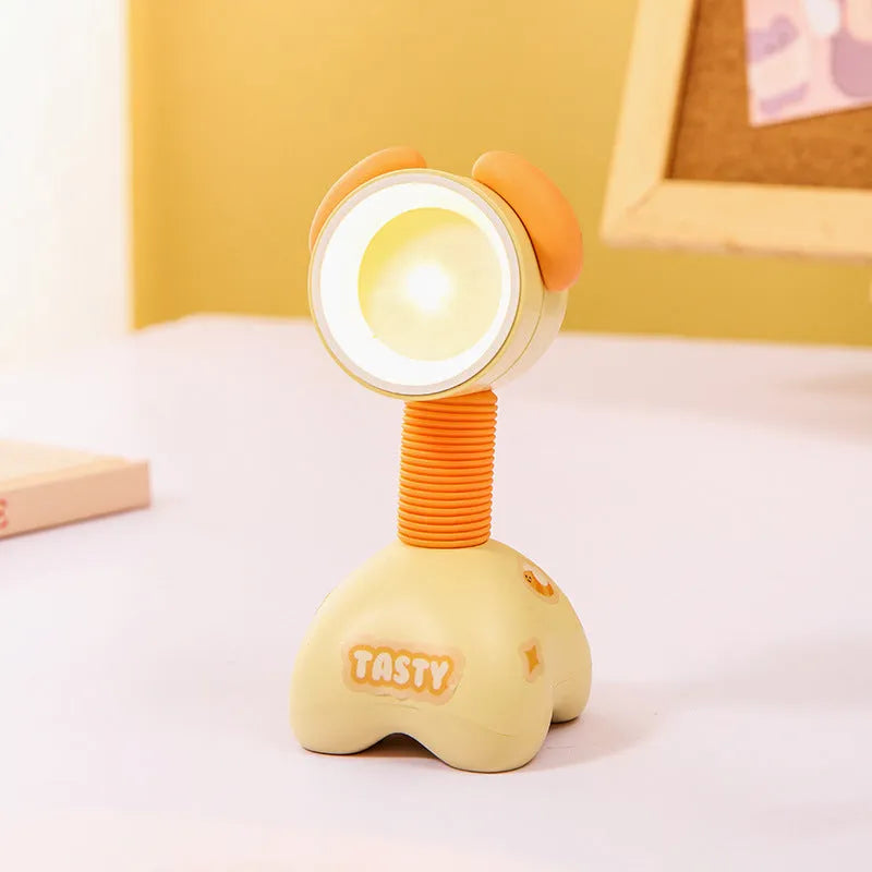 DIY magnetic cartoon small night lamp with multi-angle adjustable lighting on desktop