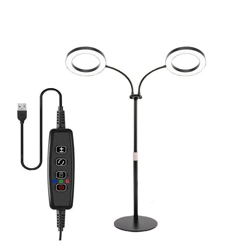 White retractable floor plant grow light with circular LED head extended on a pole.