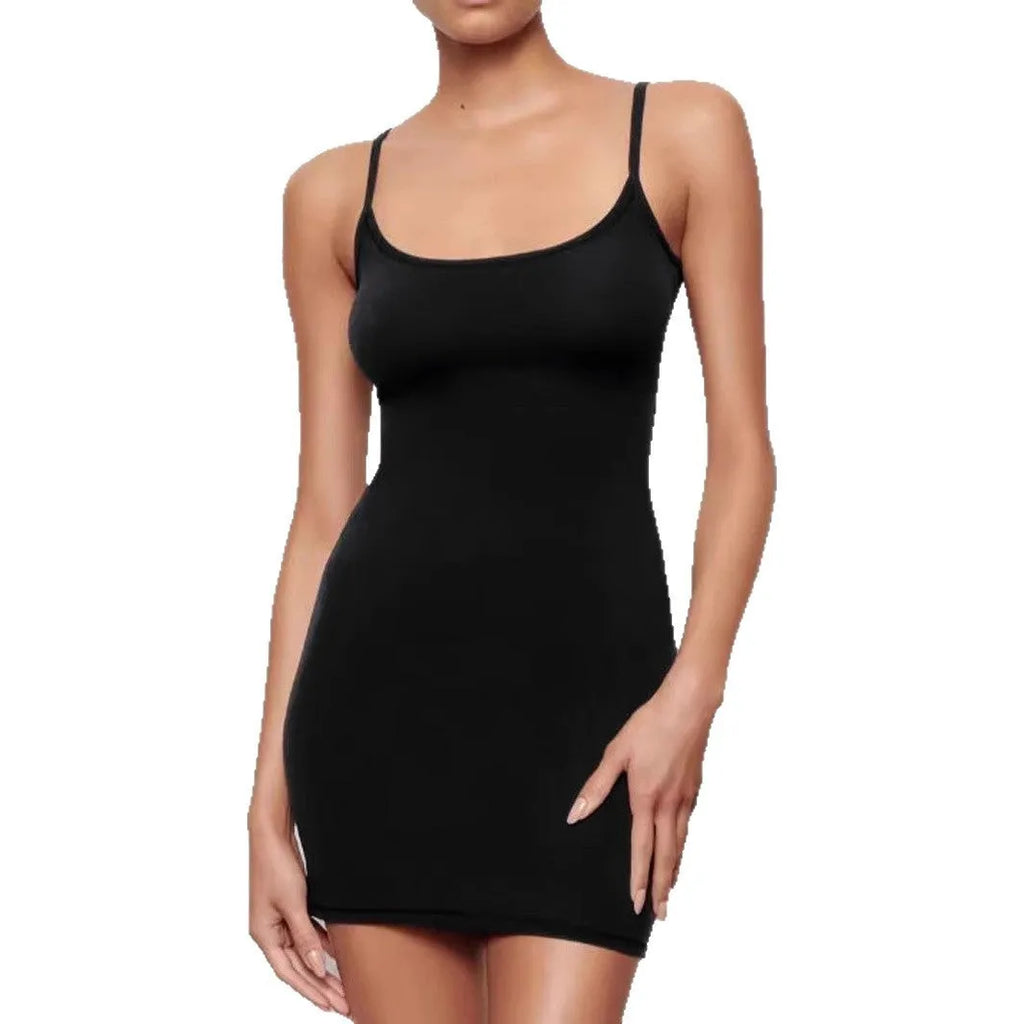 Black sleeveless sling dress with a sheath silhouette and short skirt.