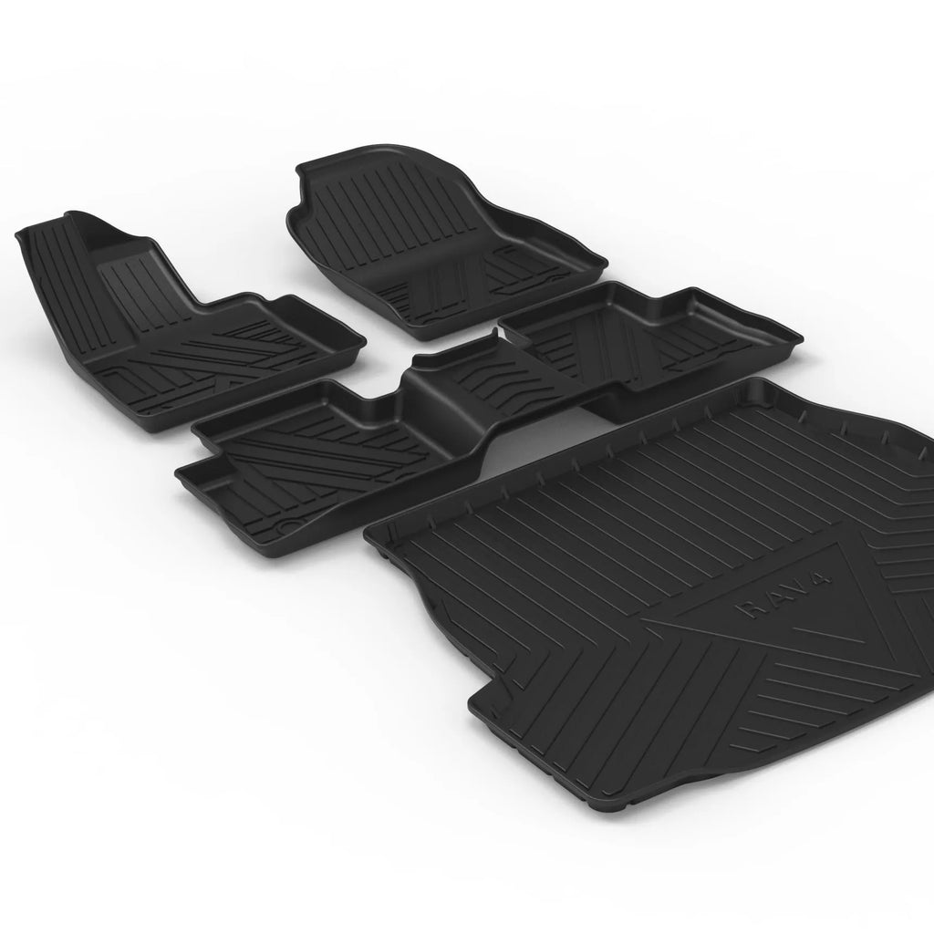 Black carbon fibre pattern TPE car trunk protector mat lying flat.