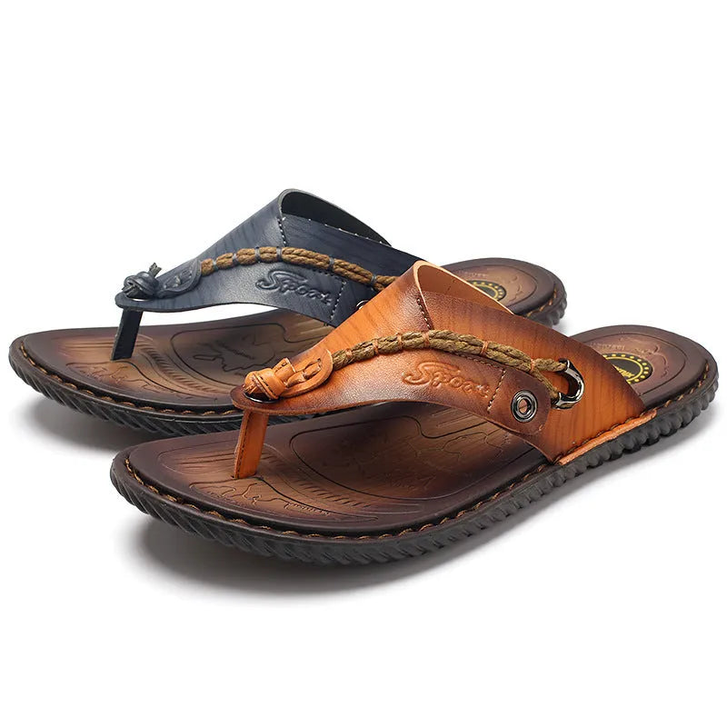 Men's dark blue herringbone patterned outdoor slippers with leather lining and rubber sole, shown in a large size.