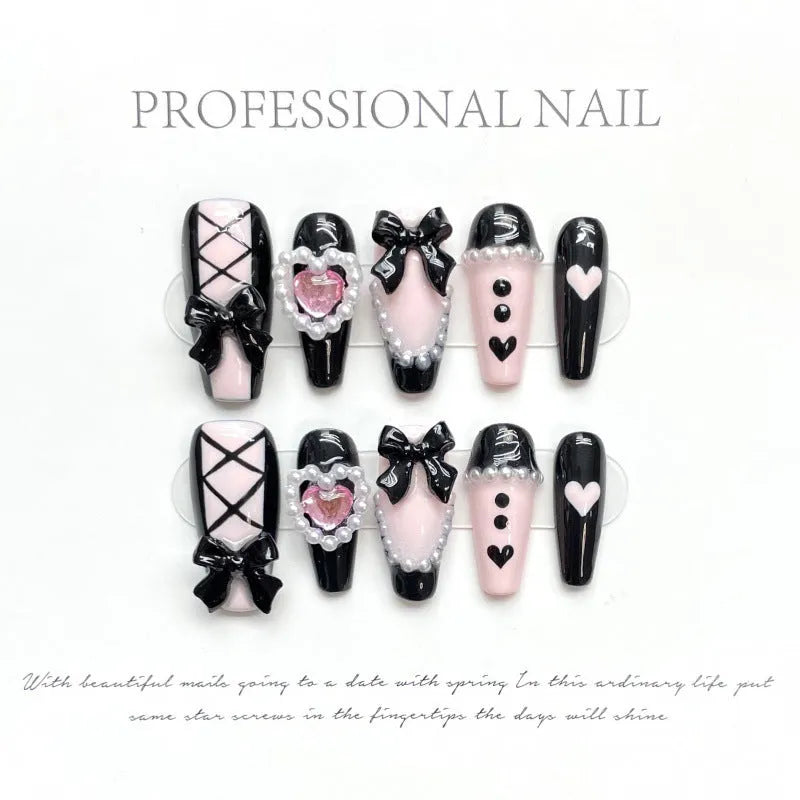 Black and peach heart hand-painted artificial nails with detachable adhesive in four sizes