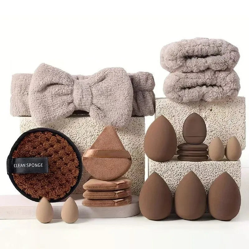Beauty tool set with multiple pieces in brown, pink and purple colours for face wash and makeup application