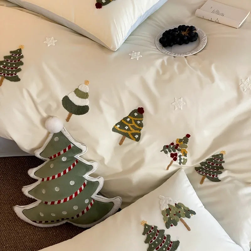 Pure cotton bedding set with embroidered Christmas trees on duvet cover, sheet, and pillowcases in cream blue or green.