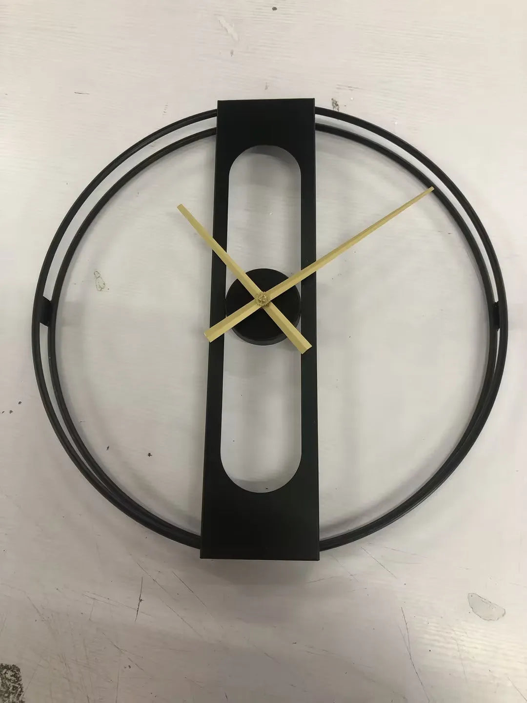 Large round metal wall clock with 50cm diameter in black or gold finish