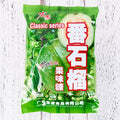 Three bags of Asian fruit hard candy: plum sugar, guava, and tangerine peel varieties with weight labels