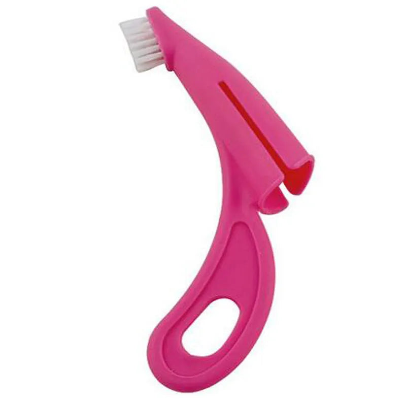 Red and white finger sleeve toothbrush for cleaning dog and cat teeth with soft silicone bristles.