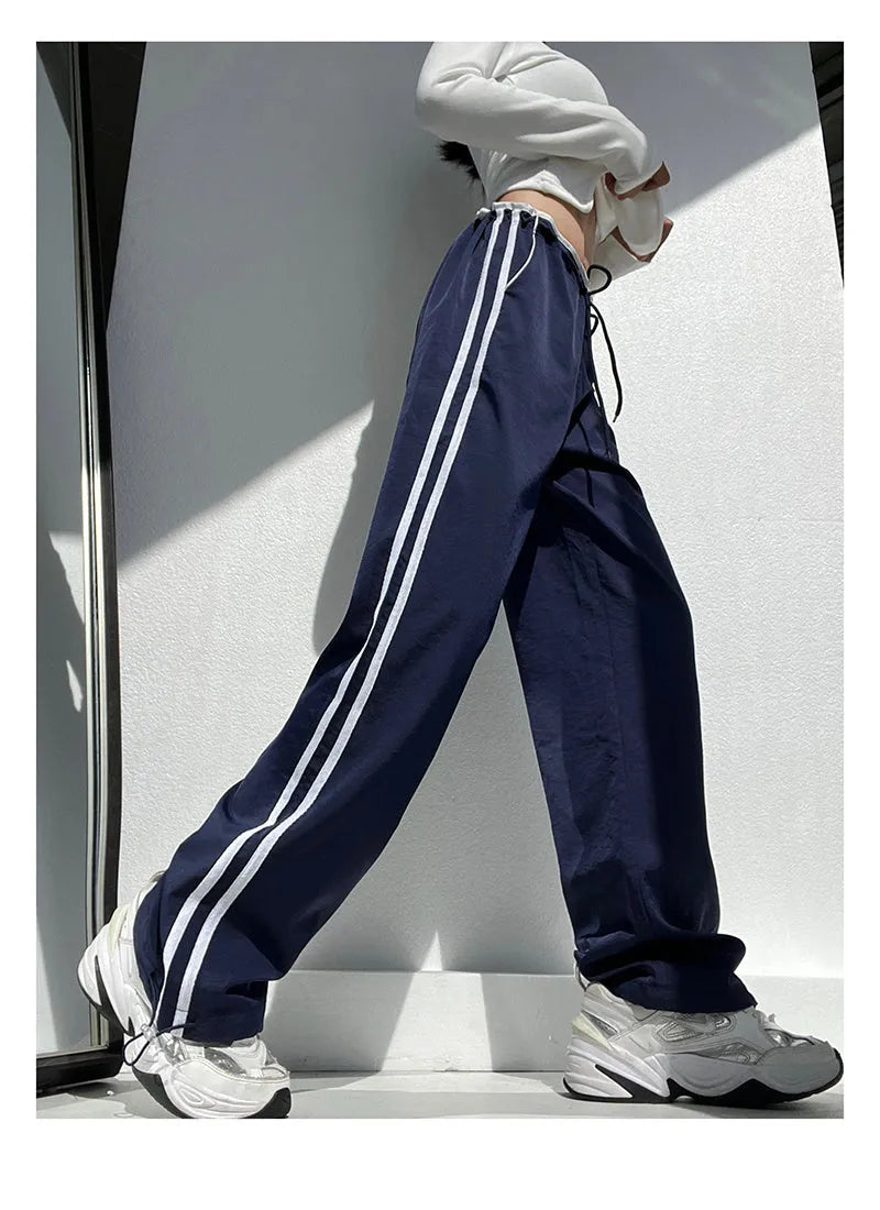 Women's loose straight trousers with contrast ribbon parallel bars detailing in white and navy blue options