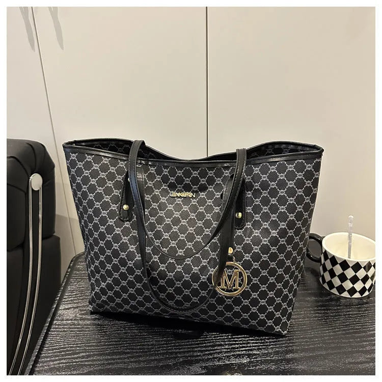 PU leather shoulder bag with adjustable strap in street trend style showing black colour option