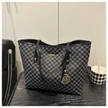 PU leather shoulder bag with adjustable strap in street trend style showing black colour option