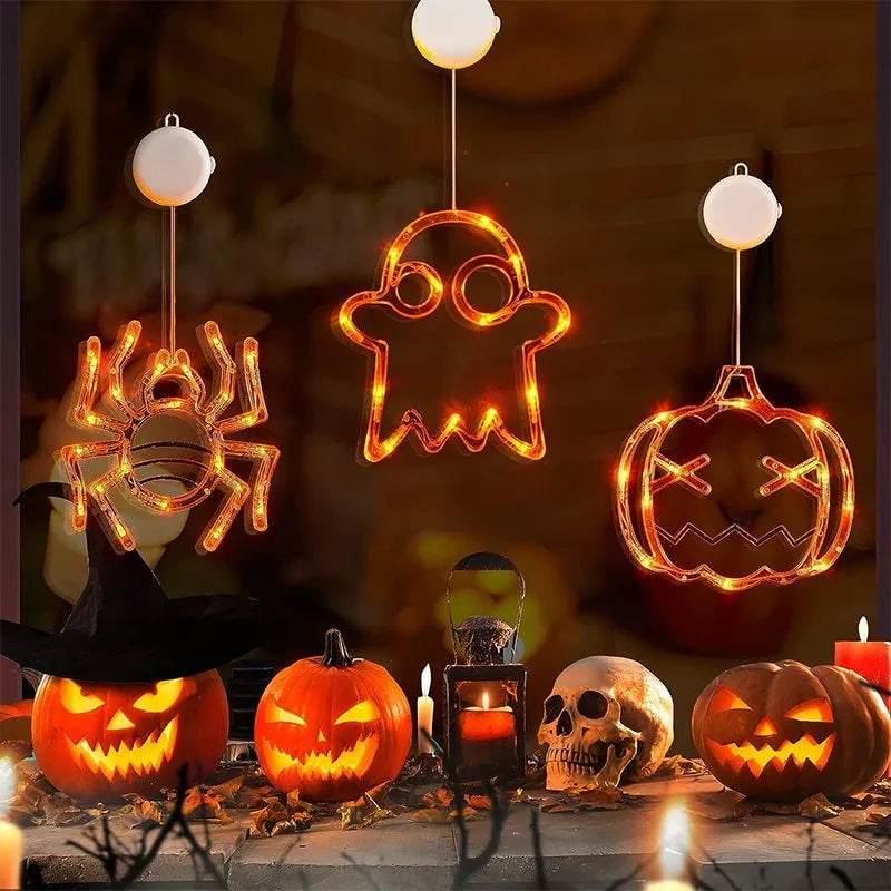 Seven Halloween themed battery-operated LED hanging lights with spider, pumpkin and ghost designs