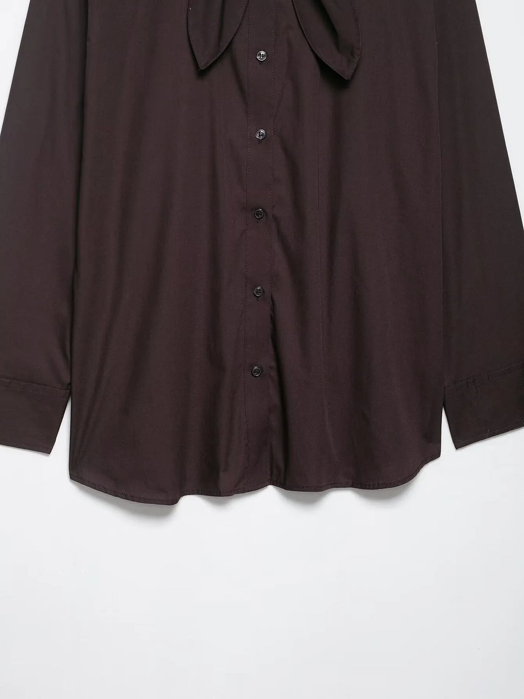 Brown women's loose fit poplin shirt with long sleeves and an integrated bow tie scarf at the neck.