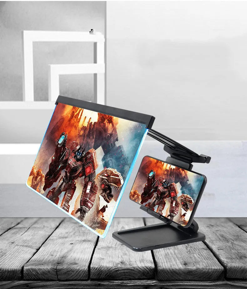 Black 12-inch mobile phone screen amplifier with detachable phone holder on desktop