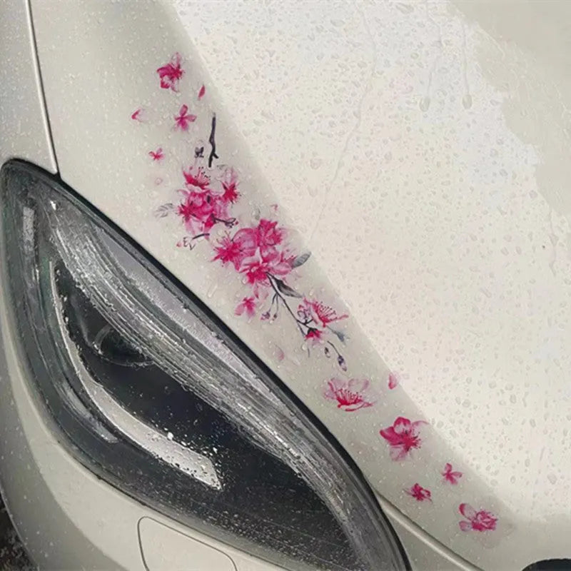 Two sizes of pink cherry blossom flower car sticker on a white background.