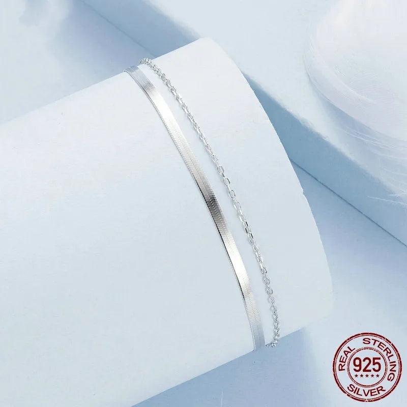 S925 sterling silver double-layer bracelet with electroplated finish, BSB193 colour, on female wrist against neutral background