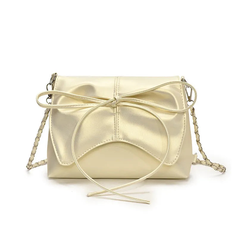Women's black PU leather crossbody underarm bag with horizontal square shape and visible sewing lines.
