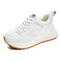 Women's beige cowhide leather casual sports shoes with mesh lining, PU sole, and cross strap detail
