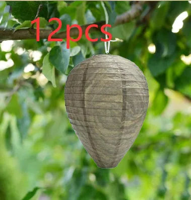 Gold beehive shaped paper lantern with honeycomb texture, shown hanging.