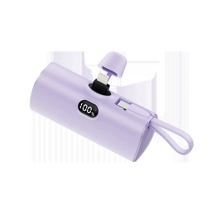 Wireless pocket power bank with digital display showing battery percentage in compact black casing