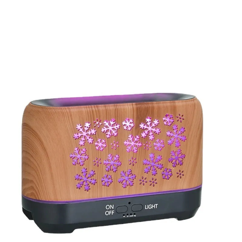 Colourful snowflake pattern wood grain aromatherapy humidifier with flame effect lighting on desktop