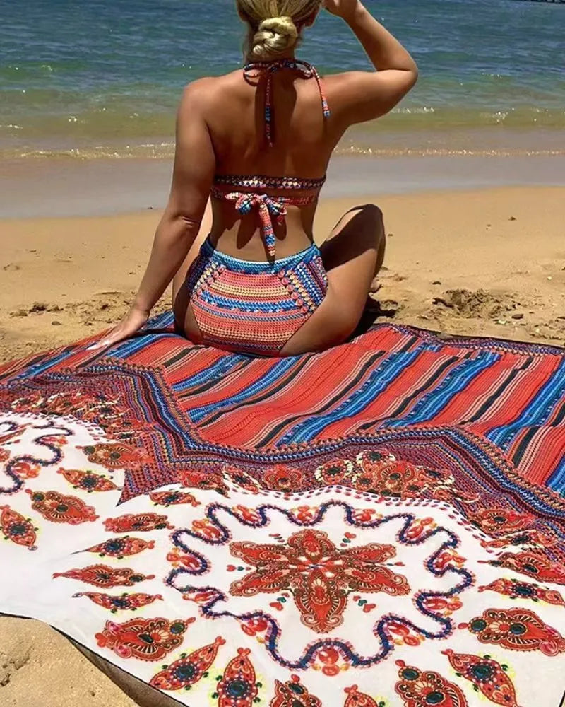 Women's three-piece swimsuit set showing high-waisted briefs, sleeveless blouse and cover-up coat in matching colour