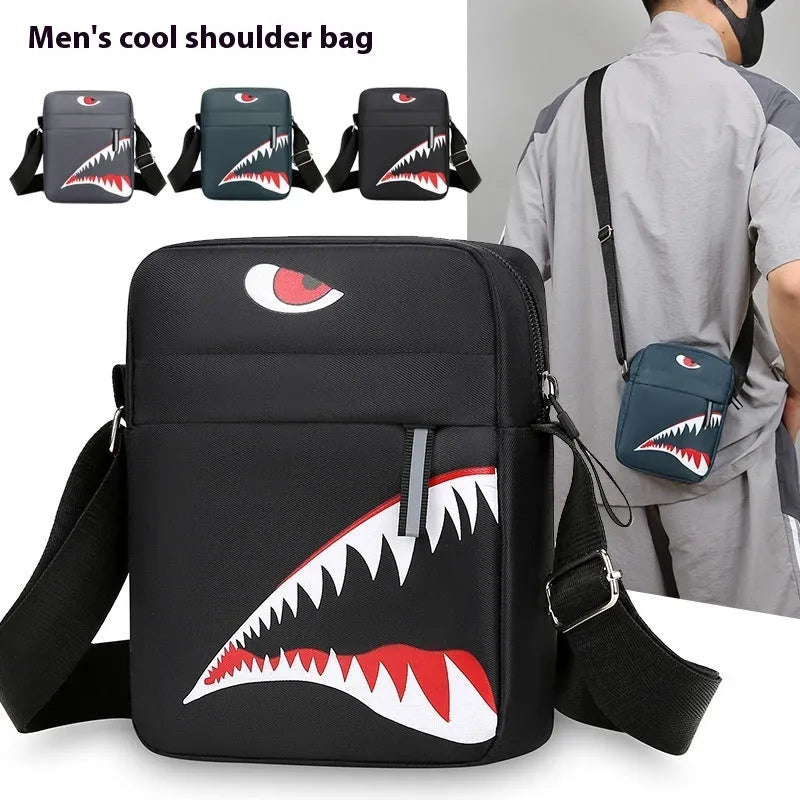 Men's black Oxford cloth crossbody bag with animal print pattern and shoulder strap.