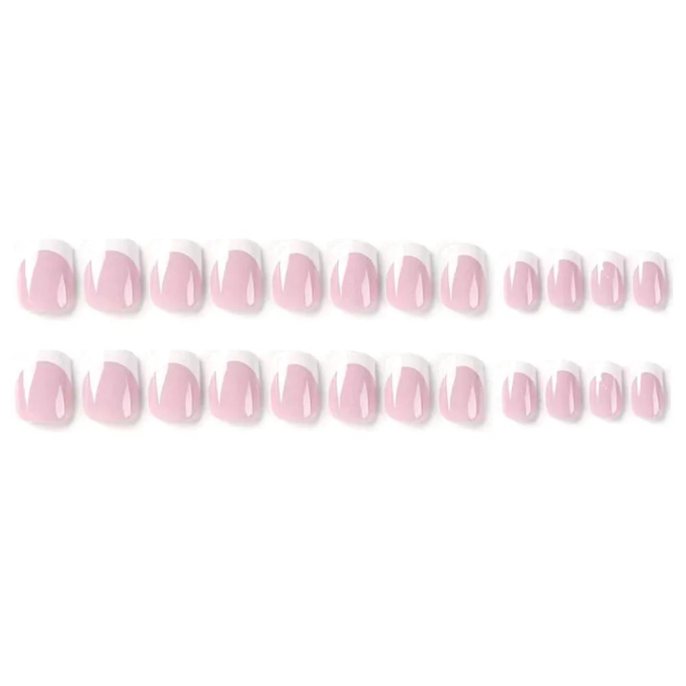 24 white plastic false nail tips with a black and white plaid pattern.