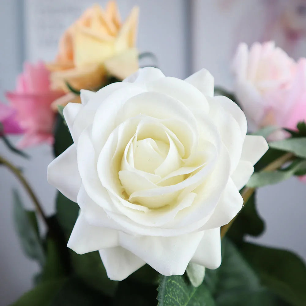Artificial silk rose flower with red petals and green plastic stem measuring approximately 42cm long