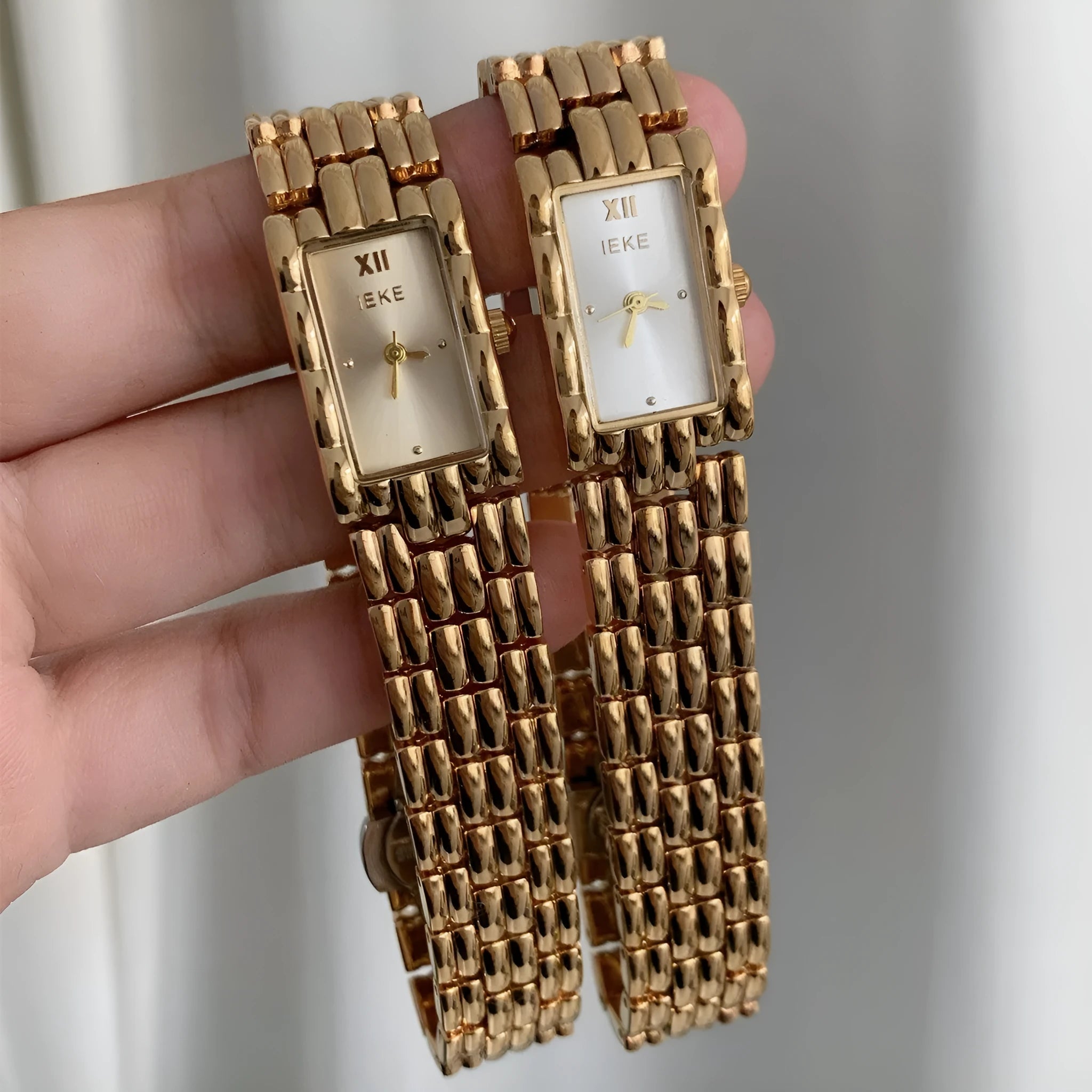 Women's mid-century inspired bracelet watch with 15mm dial and butterfly clasp buckle