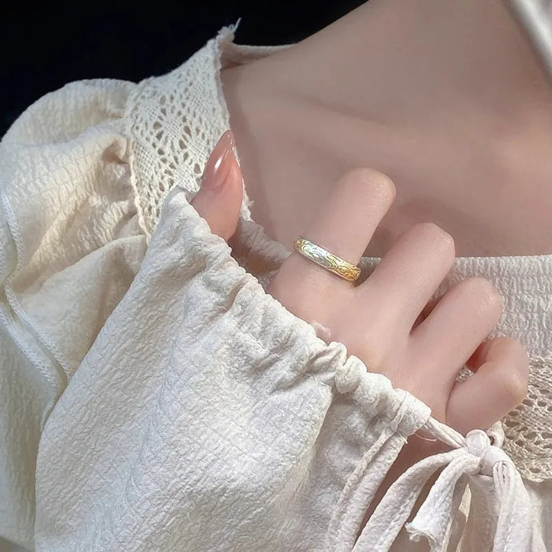 J14 Xiangyun pattern open-mouth ring in white copper with electroplated silver or gold finish.