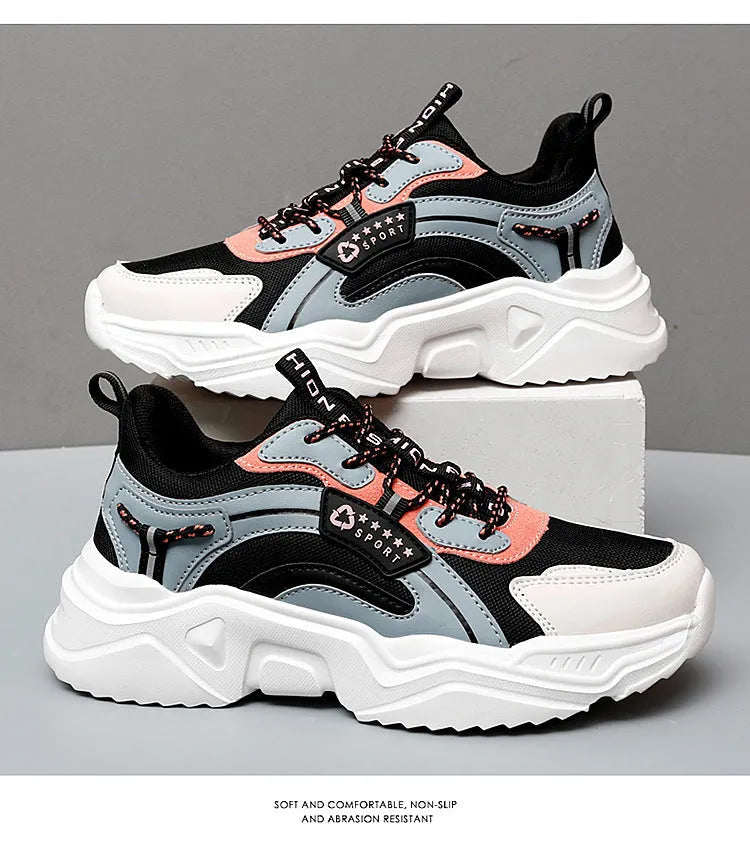 White women's casual mesh sports shoes with a buckle and thick sole.