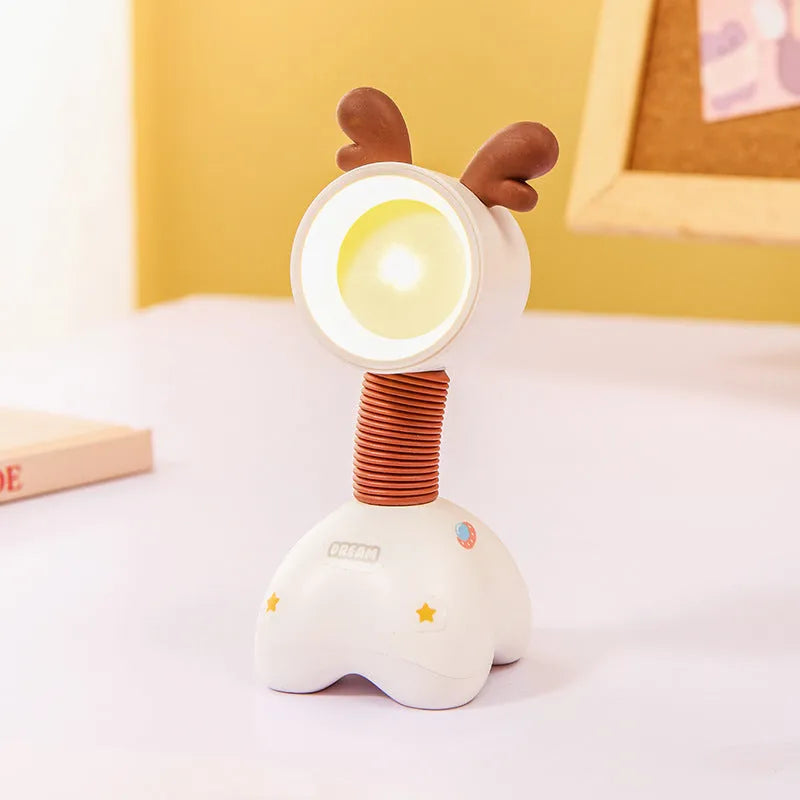 DIY magnetic cartoon small night lamp with multi-angle adjustable lighting on desktop