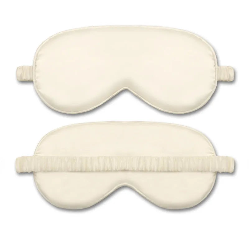 Double-sided silk-like sleep mask in rayon satin, shown in multiple colour options on a white background.