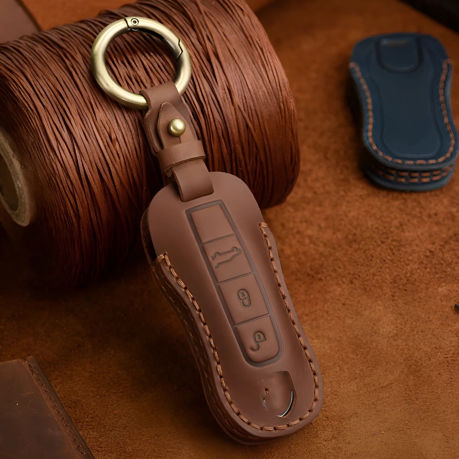 Genuine cowhide leather Porsche key cover with retro bag buckle in blue and brown colour options