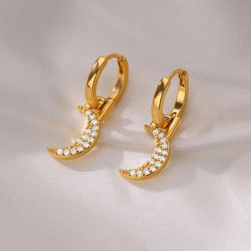 Women's copper butterfly earrings with irregular geometric heart and star designs in multiple colours