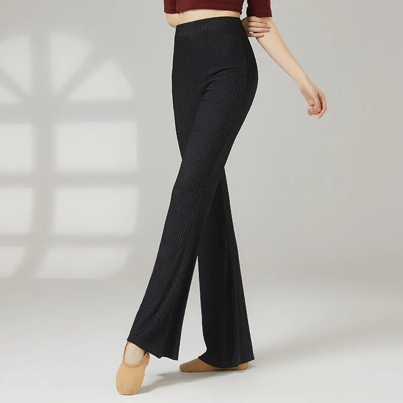 Women's solid colour stretch polyester dance practice pants for ballet and sports dance training.