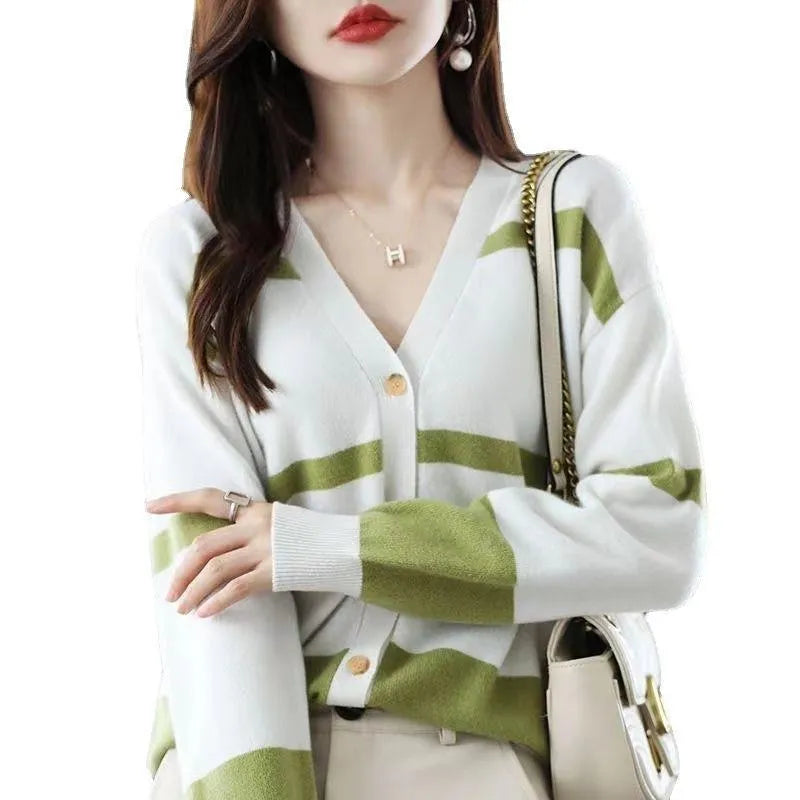 Women's striped V-neck knitted cardigan with 3D pattern in camel colour.