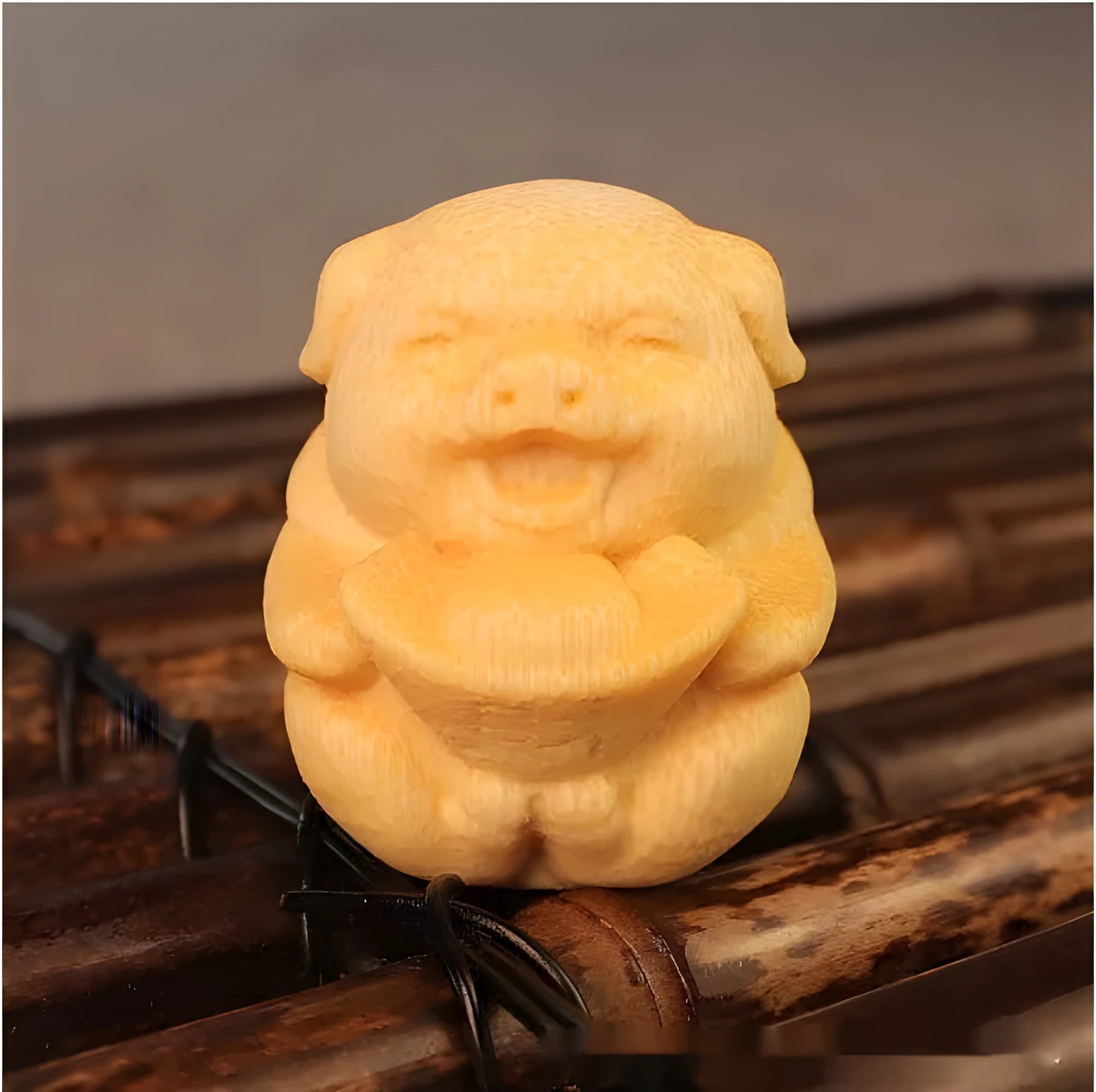 Solid bamboo pig carving ornament measuring 4cm tall with 3.5cm diameter