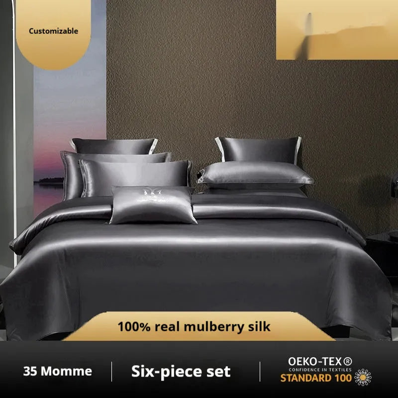 Silk four-piece bed set in a solid colour showing duvet cover and matching pillowcases.