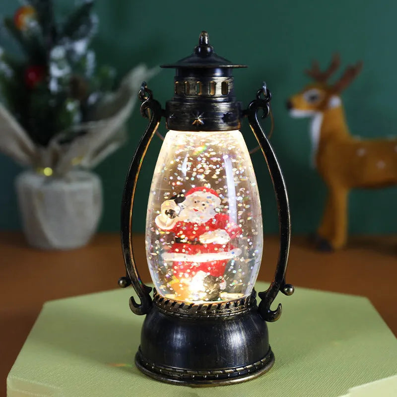 LED crystal ball Christmas decoration with illuminated oil lamp snowman figure on tabletop
