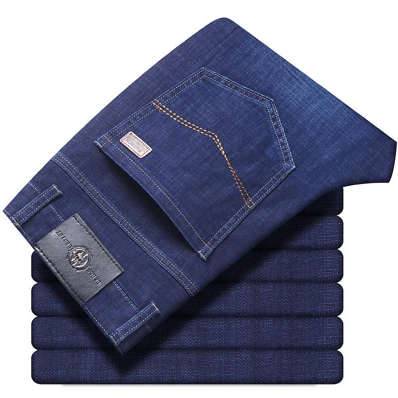 Women's straight leg stretch jeans in K276 blue denim, shown in a loose fit on a model.