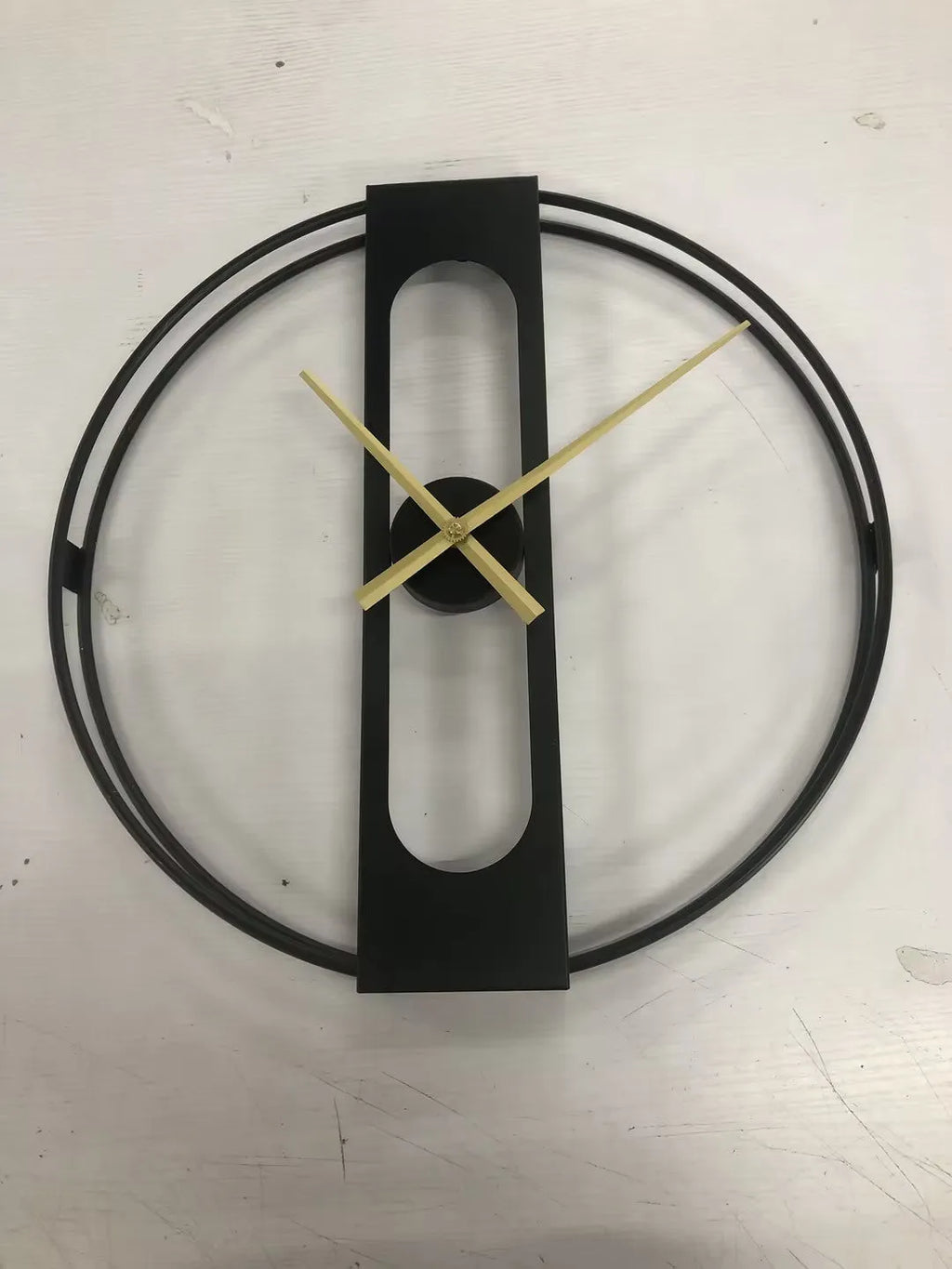 Large round metal wall clock with 50cm diameter in black or gold finish